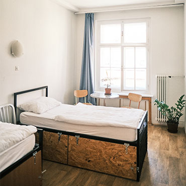 Mixed shared room with 2 beds